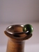 navelpiercing met groen balletje