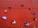 ketting van metaaldraad en schelp rood/paars