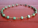ketting van glaskralen groen/oranje